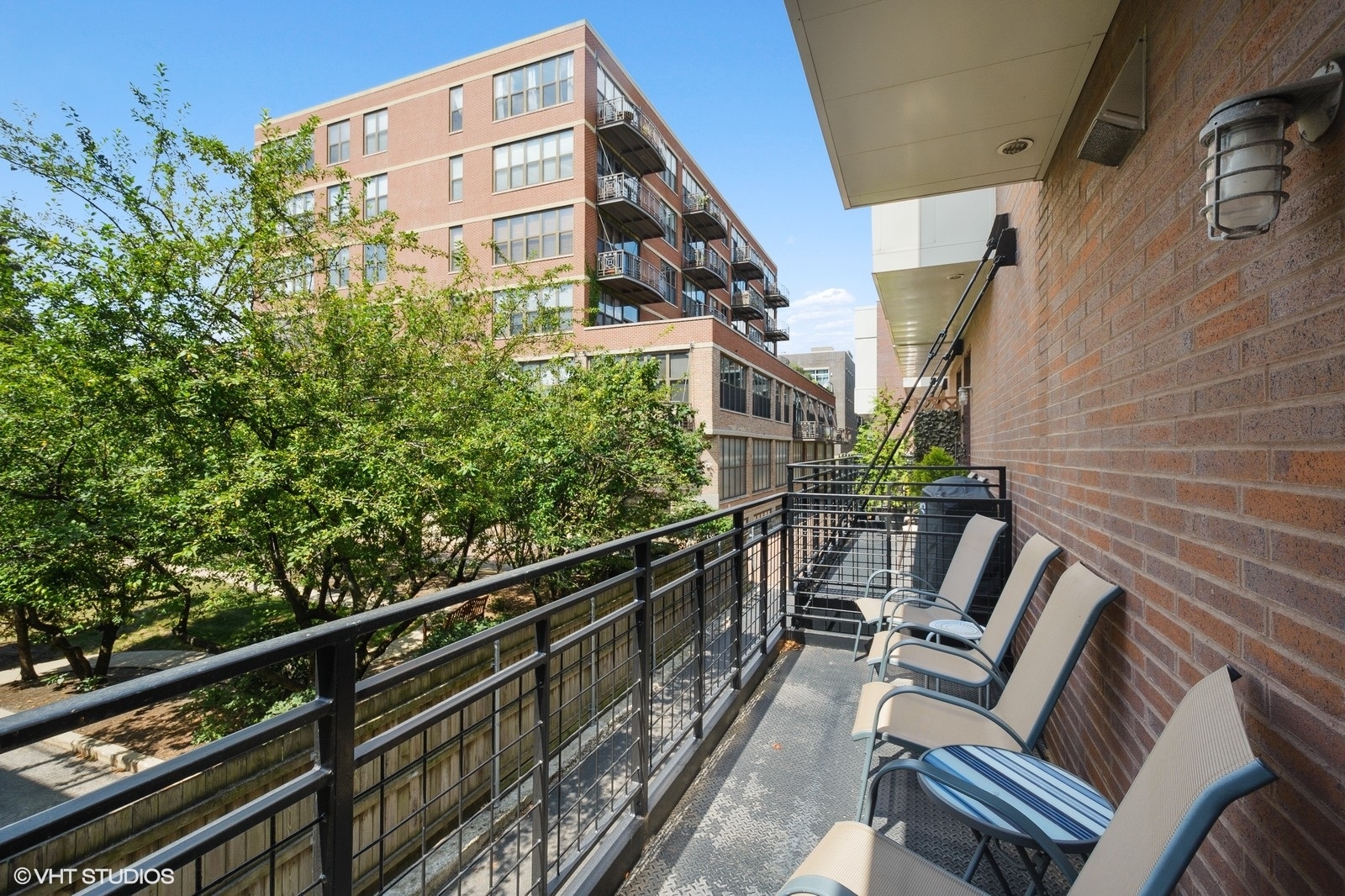 1244 West Monroe Street, Unit 4 Chicago, IL 60607 - Photo 16 of 16 a view of a chairs and table in the balcony