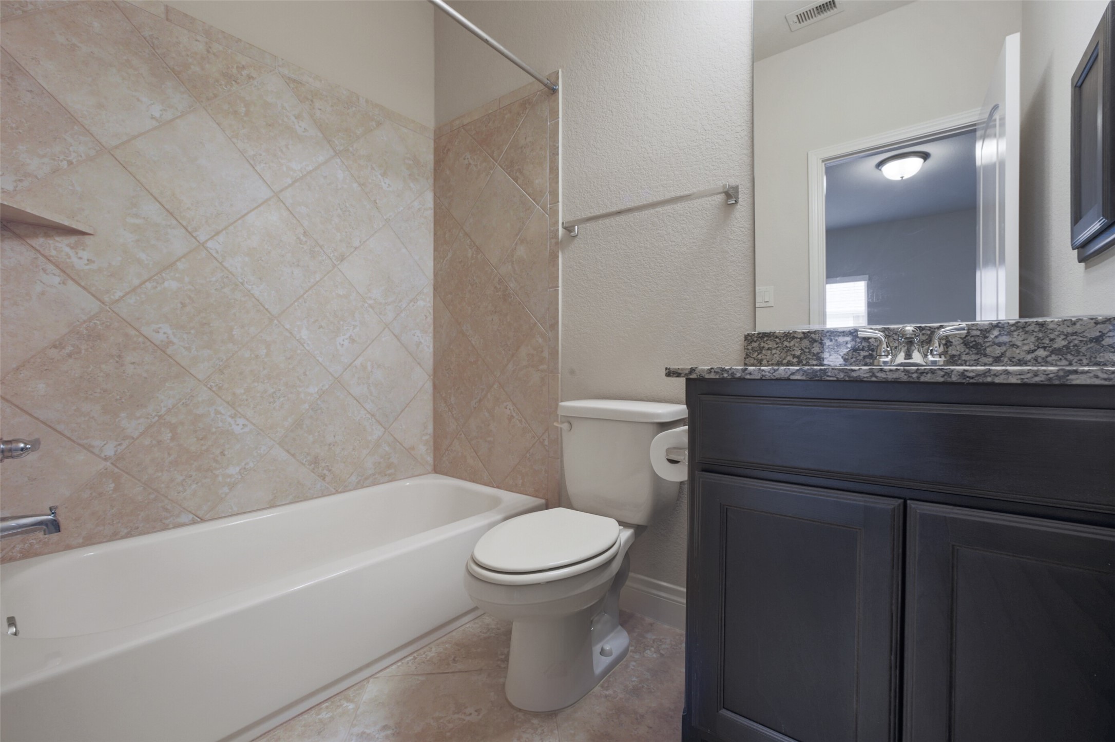 2707 River Run Road Missouri City, TX 77459 - Photo 35 of 45 a bathroom with a sink toilet and shower