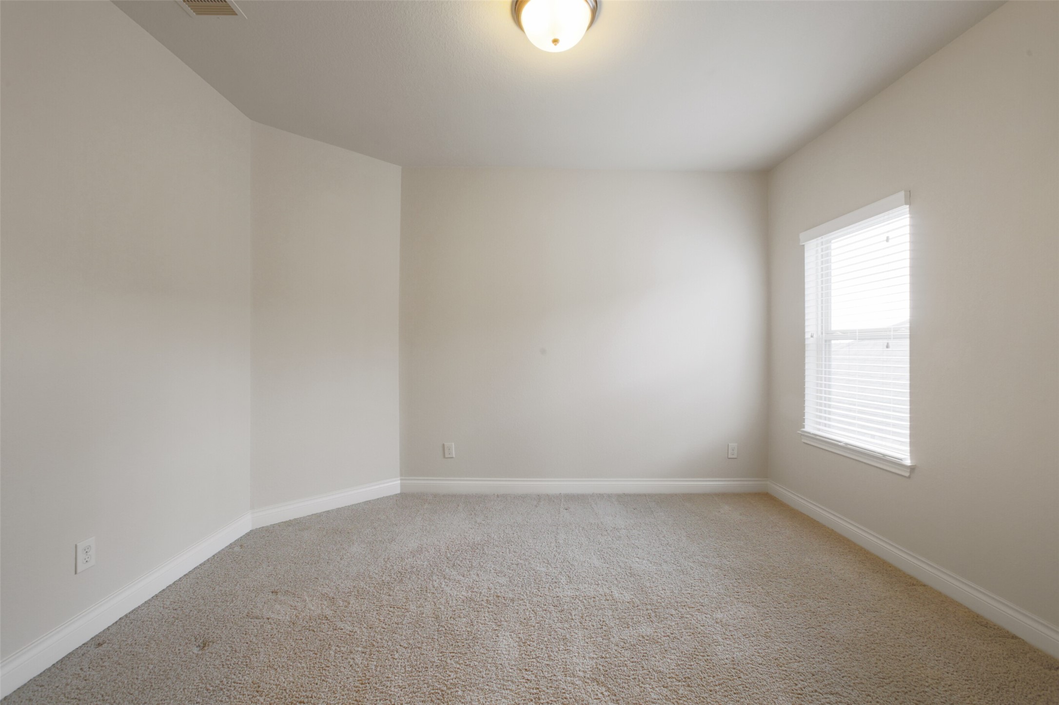 2707 River Run Road Missouri City, TX 77459 - Photo 36 of 45 an empty room with a window