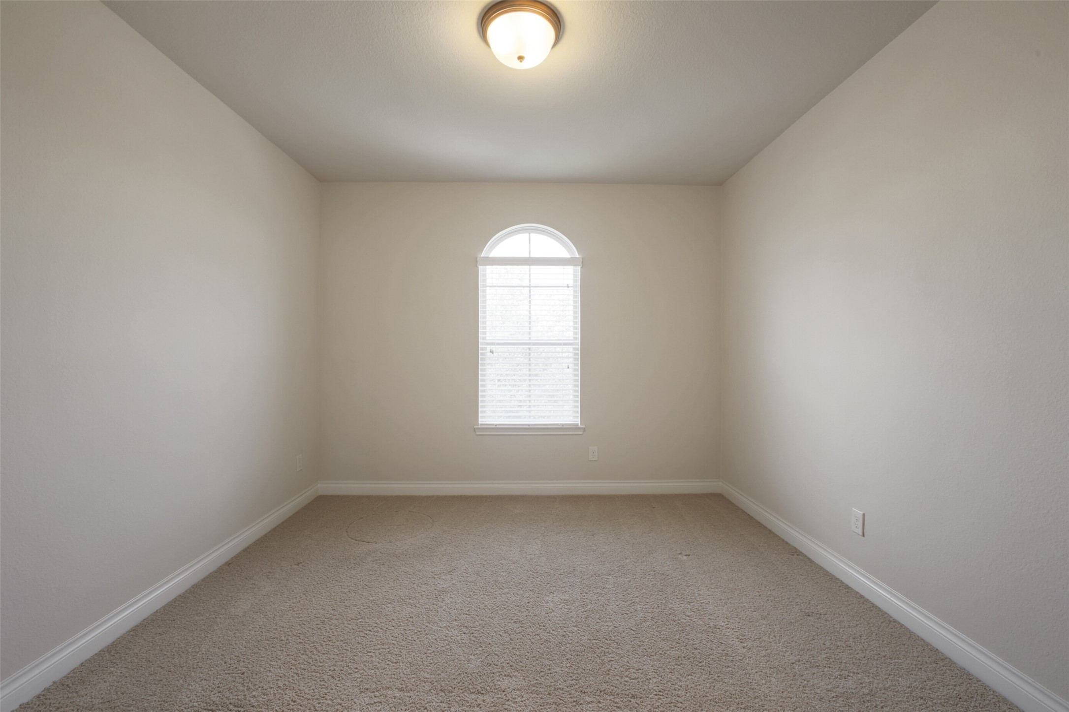 2707 River Run Road Missouri City, TX 77459 - Photo 39 of 45 an empty room with a window