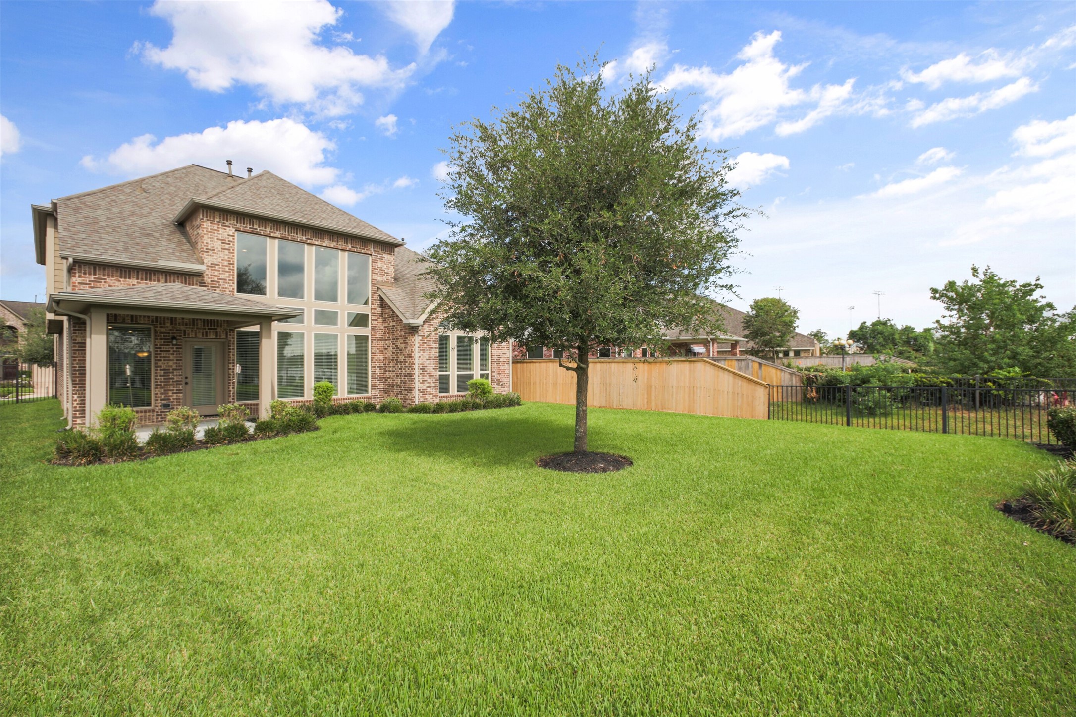 2707 River Run Road Missouri City, TX 77459 - Photo 43 of 45 a front view of a house with a garden