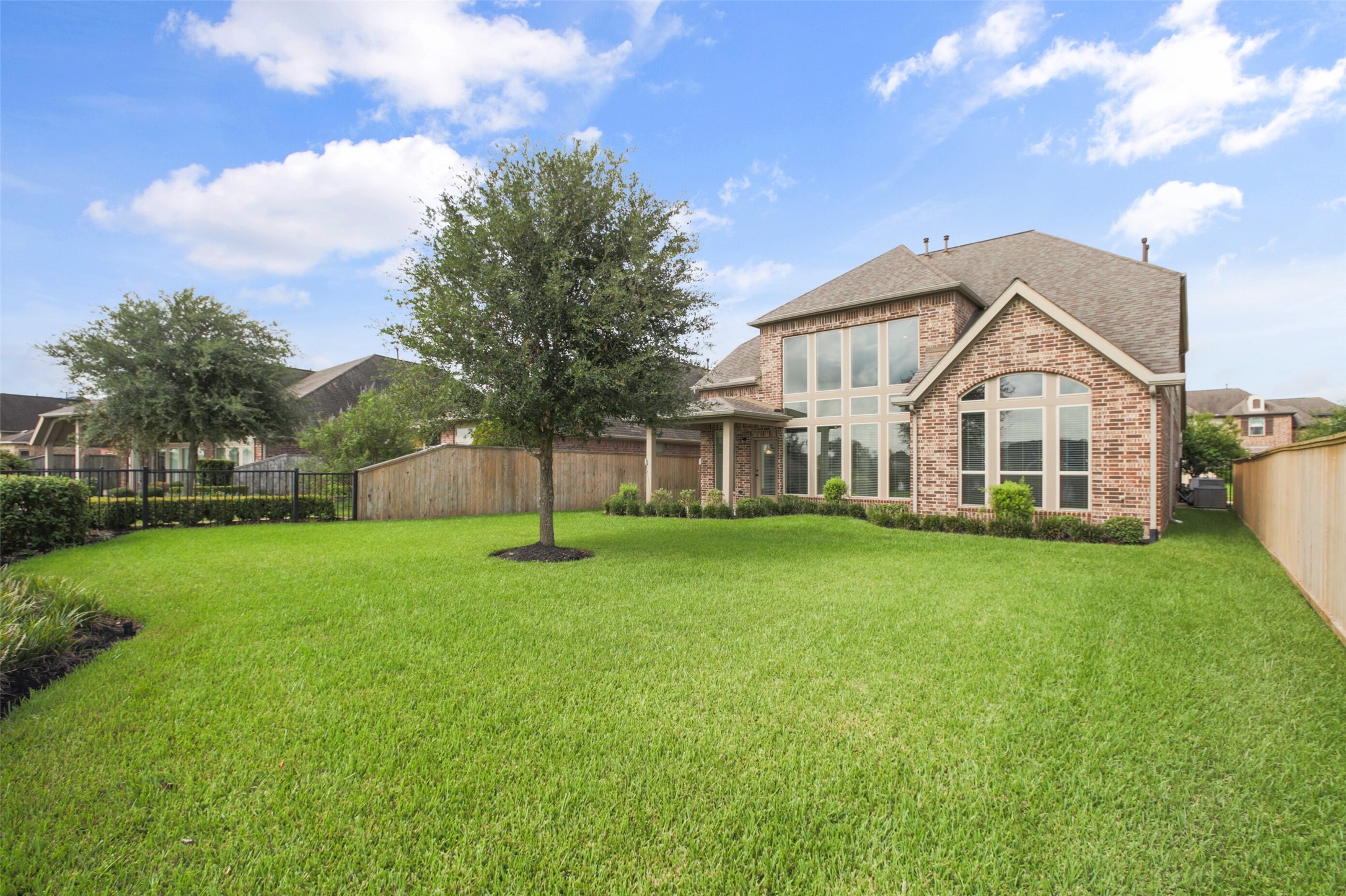 2707 River Run Road Missouri City, TX 77459 - Photo 44 of 45 a view of a house with a yard and sitting area
