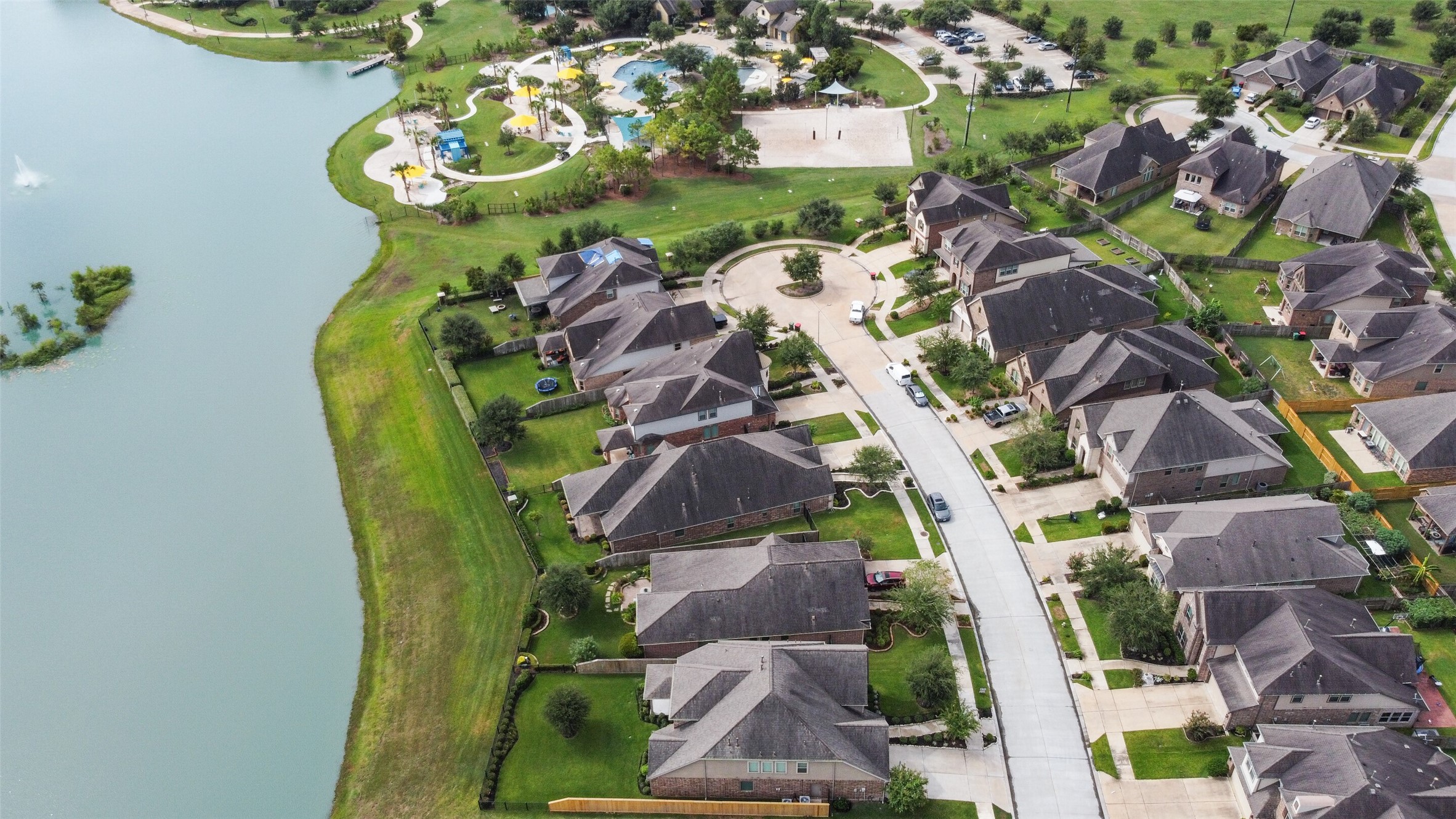 2707 River Run Road Missouri City, TX 77459 - Photo 5 of 45 an aerial view of a swimming pool