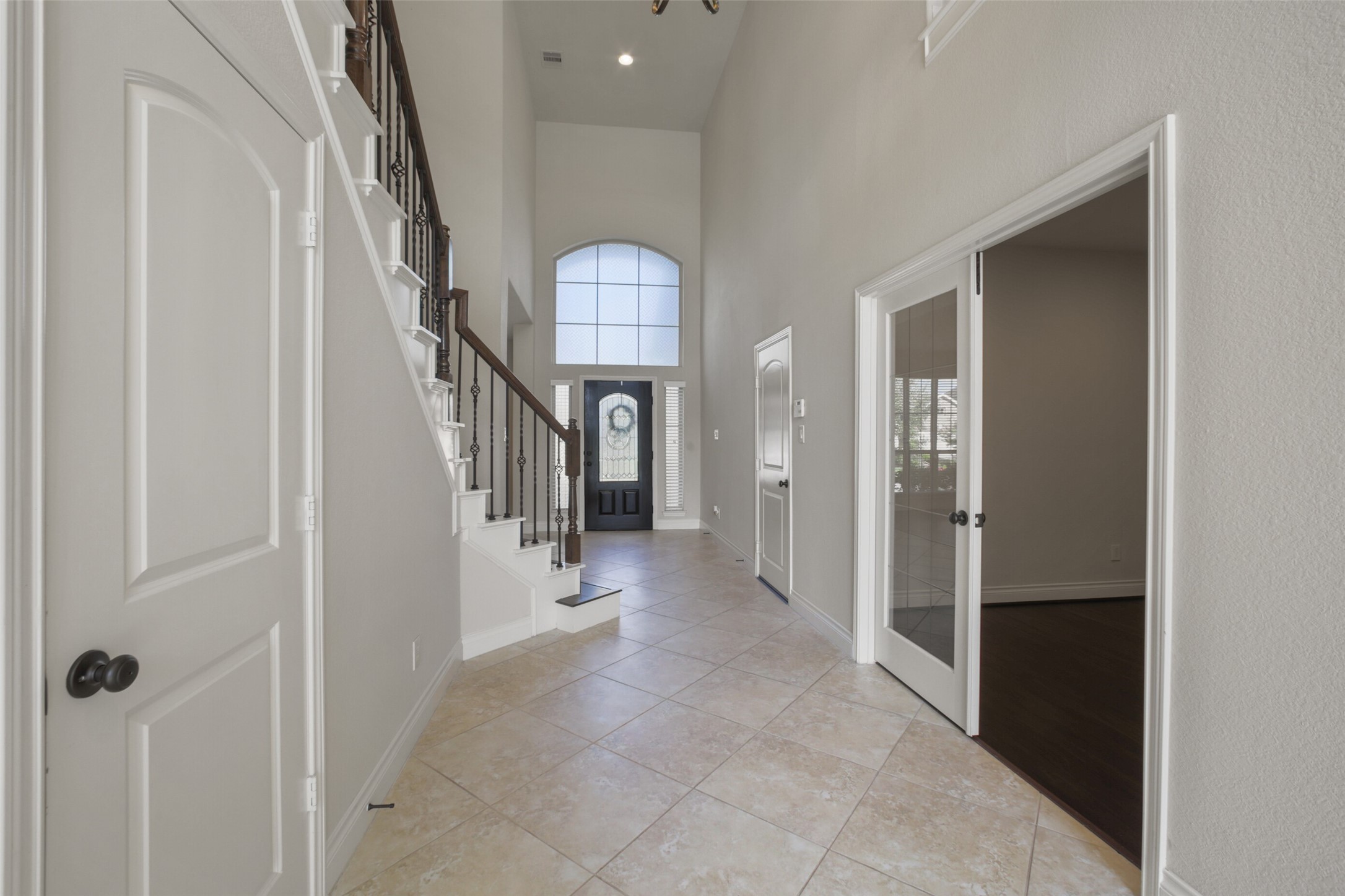 2707 River Run Road Missouri City, TX 77459 - Photo 9 of 45 a view of a hallway with wooden floor and entryway