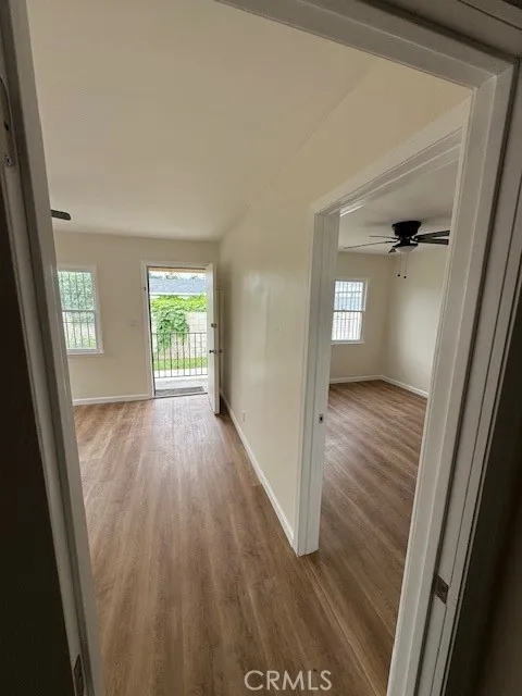 11222 Concert Street El Monte, CA 91731 - Photo 8 of 15 wooden floor in an empty room with a window