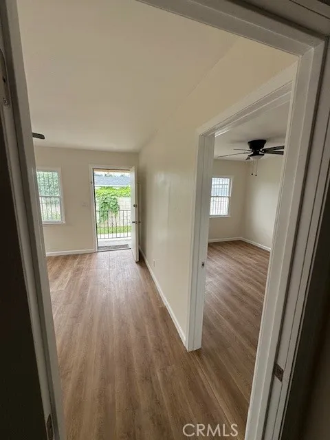 11222 Concert Street El Monte, CA 91731 - Photo 8 of 15 wooden floor in an empty room with a window