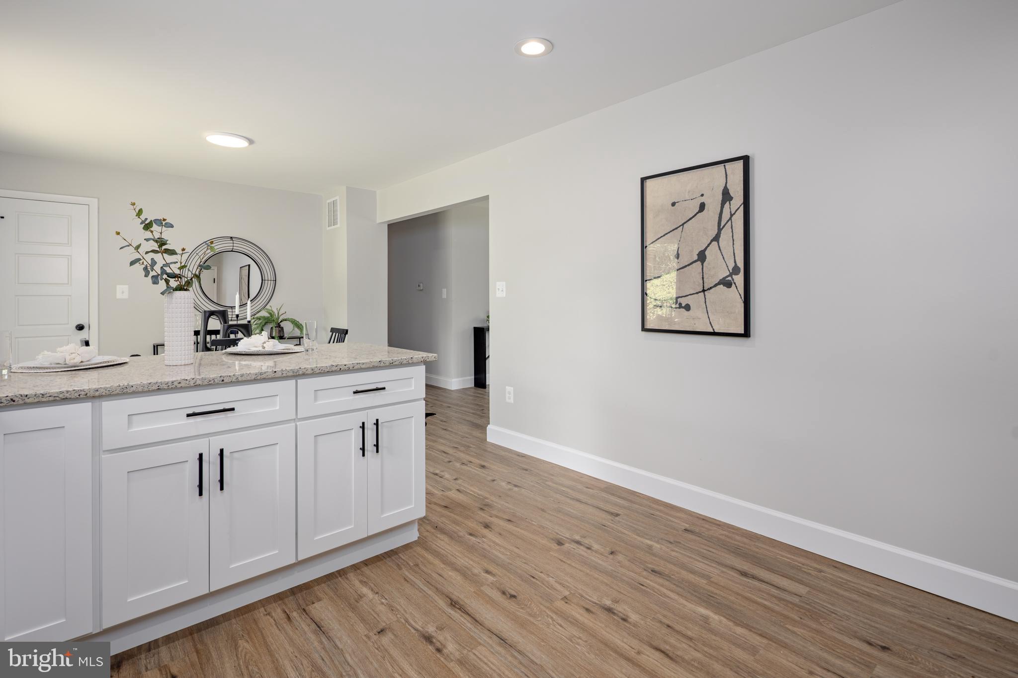 2400 Stoneybrook Road Fallston, MD 21047 - Photo 13 of 45 a spacious bathroom with a double vanity sink and a mirror