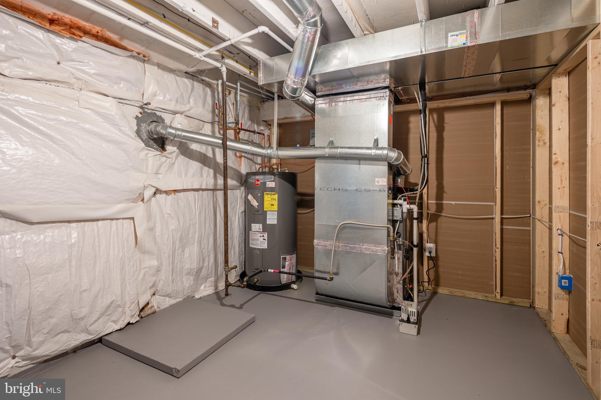 2400 Stoneybrook Road Fallston, MD 21047 - Photo 34 of 45 a view of water heater room with staircase