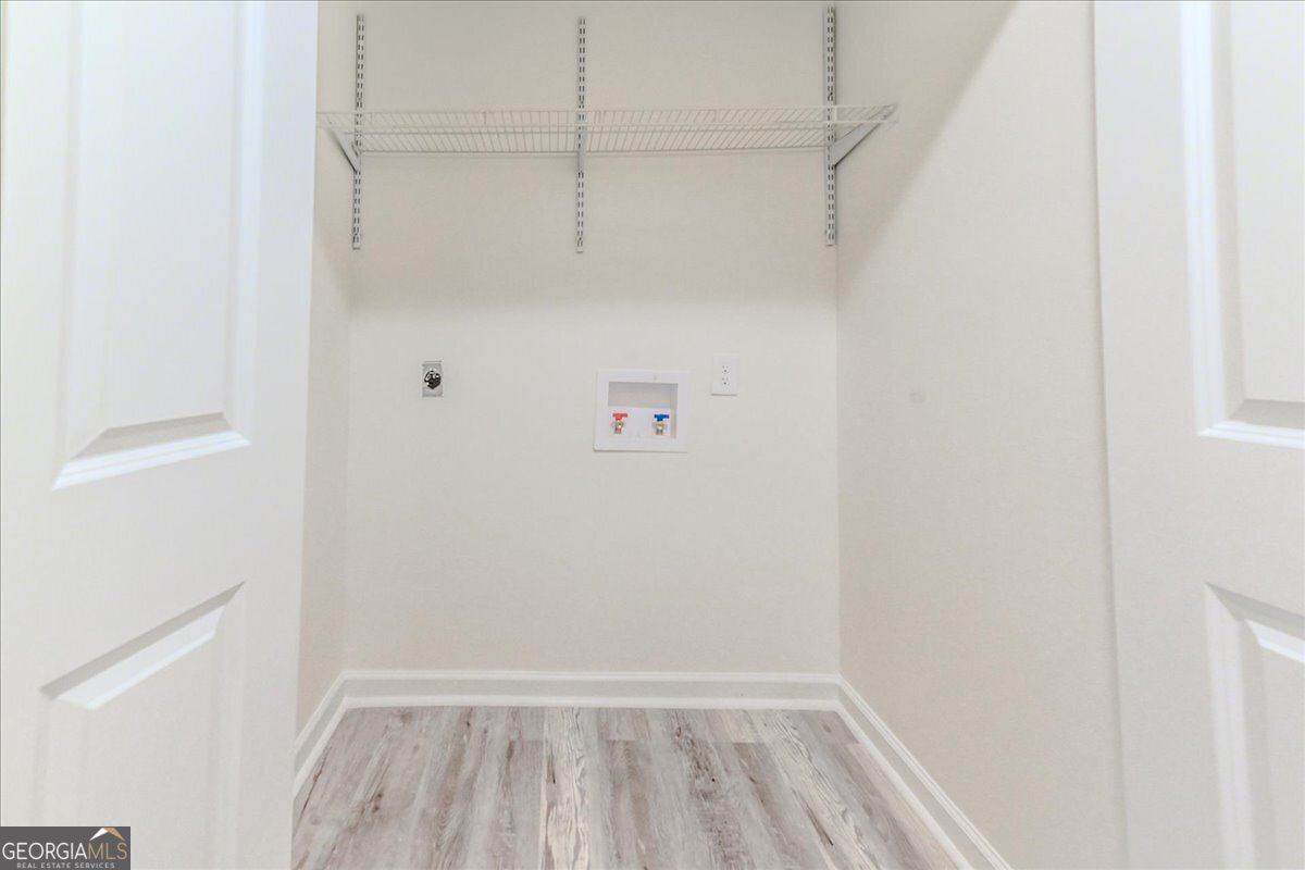 111 Collins Street Byron, GA 31008 - Photo 13 of 26 a view of an empty walk in closet