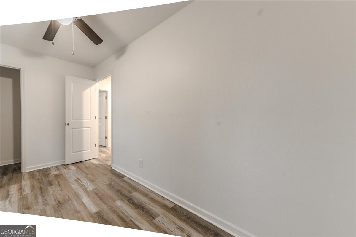 111 Collins Street Byron, GA 31008 - Photo 8 of 26 a view of an empty room