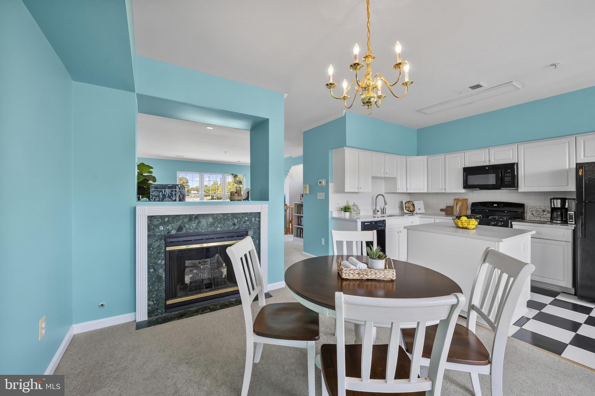 6789 Stone Maple Terrace Centreville, VA 20121 - Photo 8 of 25 Dining room w/fireplace
