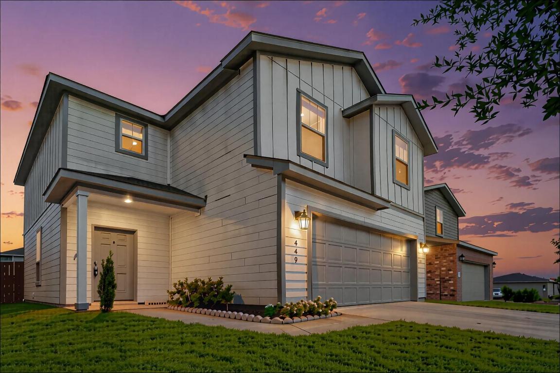 449 Stone Water Lane Jarrell, TX 76537 - Photo 2 of 21 a front view of a house with a yard