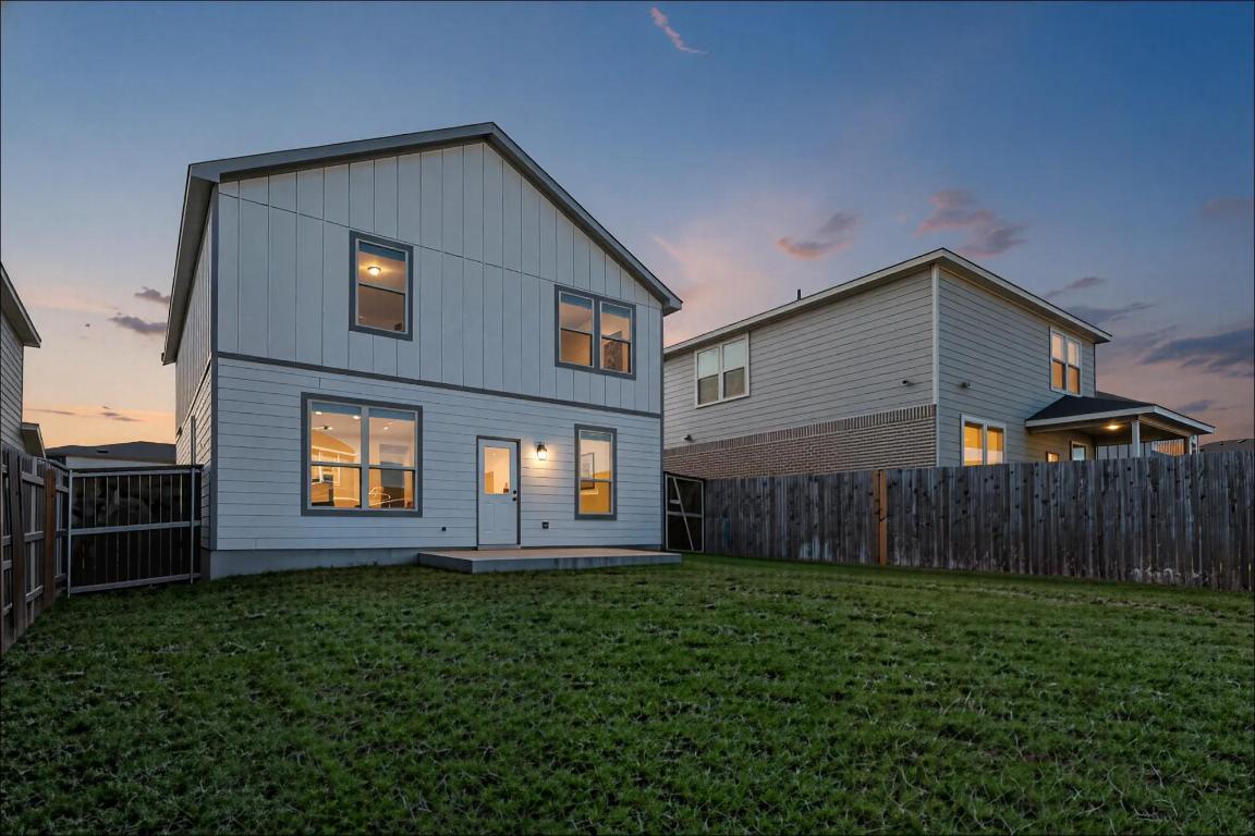 449 Stone Water Lane Jarrell, TX 76537 - Photo 21 of 21 a front view of a house with garden