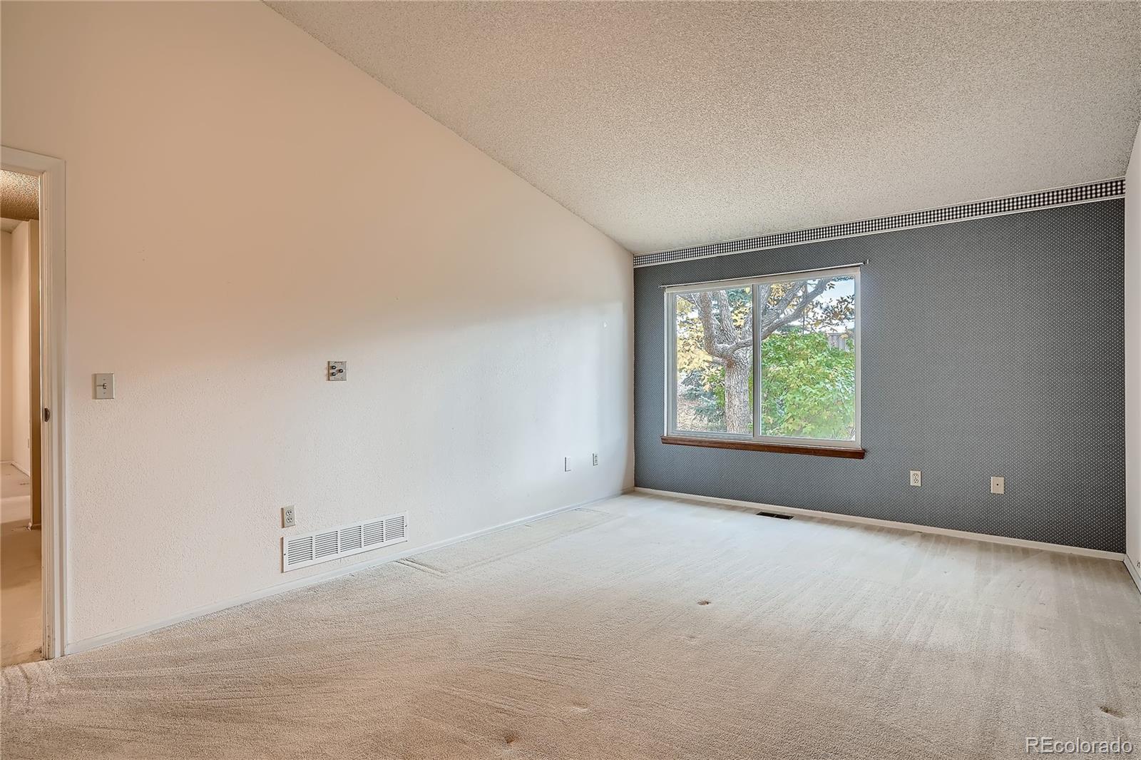 6 Shetland Court Highlands Ranch, CO 80130 - Photo 18 of 33 a view of a room that has a window in it