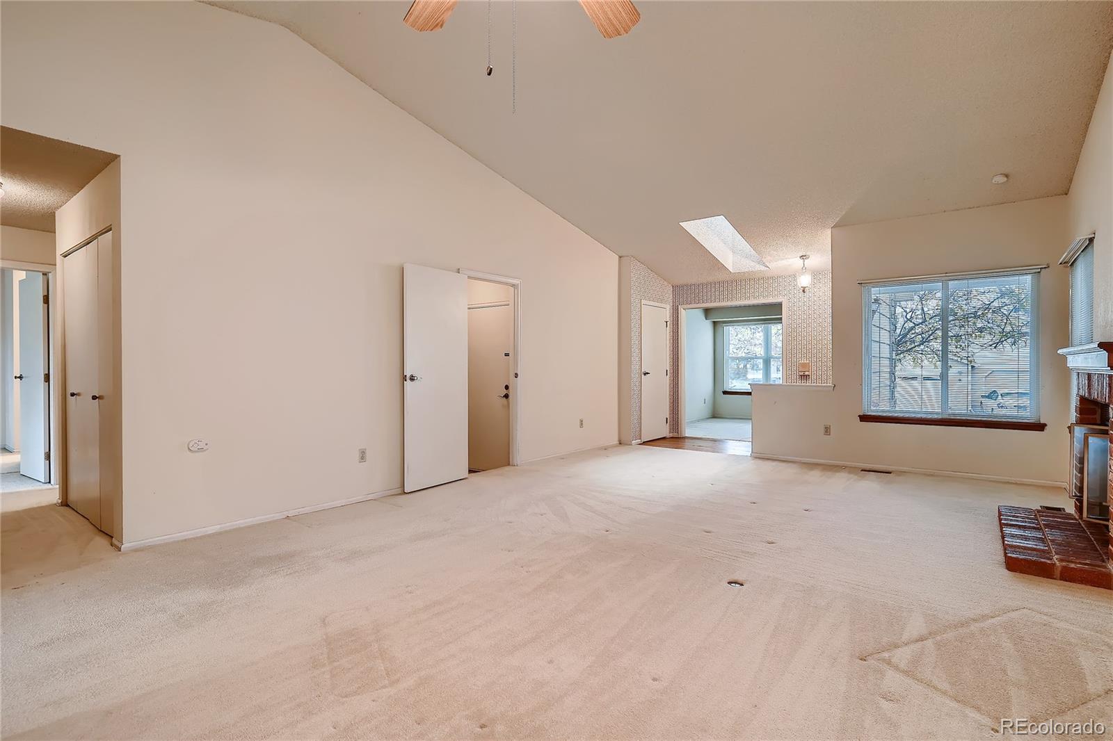 6 Shetland Court Highlands Ranch, CO 80130 - Photo 7 of 33 a view of an empty room with a window