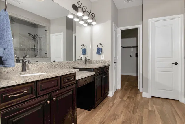a bathroom with a bath tub and a shower