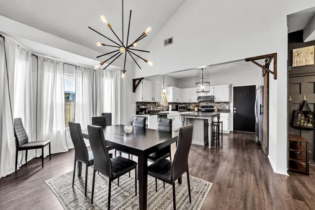 a small white house with a outdoor space