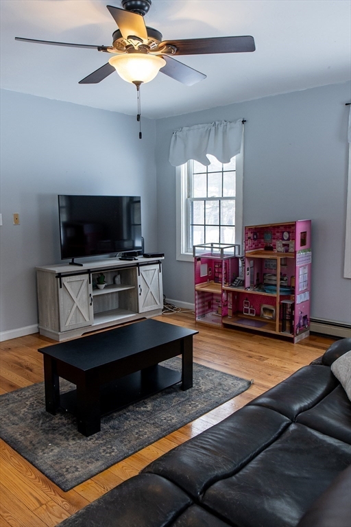 20 Paige Hill Road Brimfield, MA 01010 - Photo 23 of 40 a living room with furniture and a flat screen tv