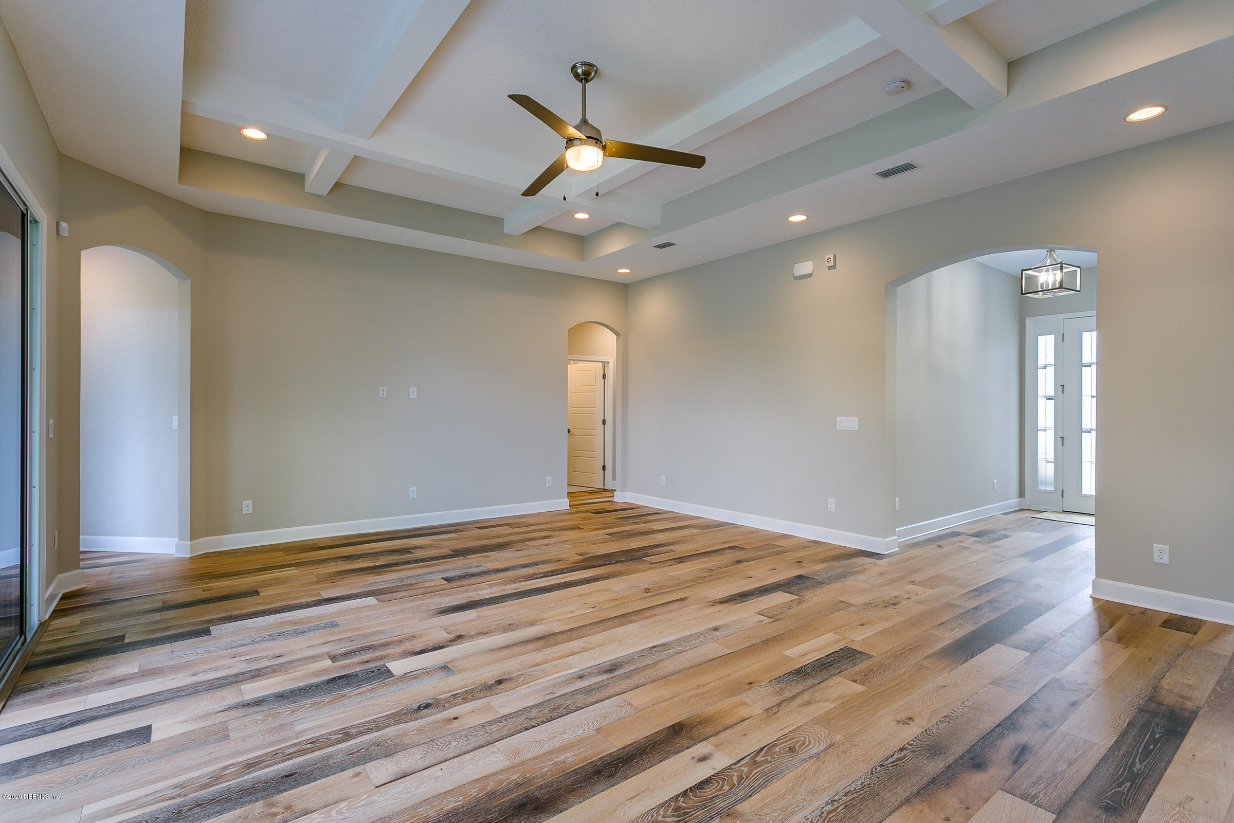 596 West Bianca Circle St. Augustine, FL 32086 - Photo 11 of 37 a view of an empty room and wooden floor