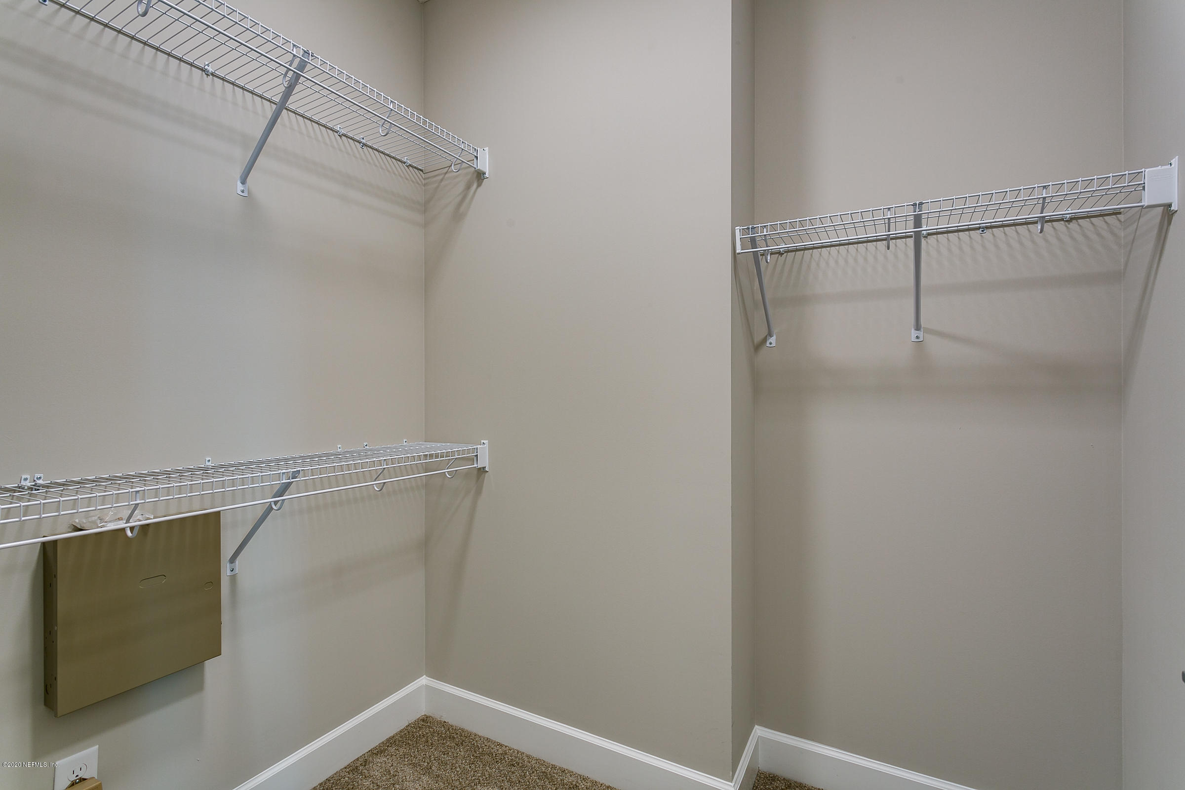 596 West Bianca Circle St. Augustine, FL 32086 - Photo 25 of 37 a view of a room with racks on the wall