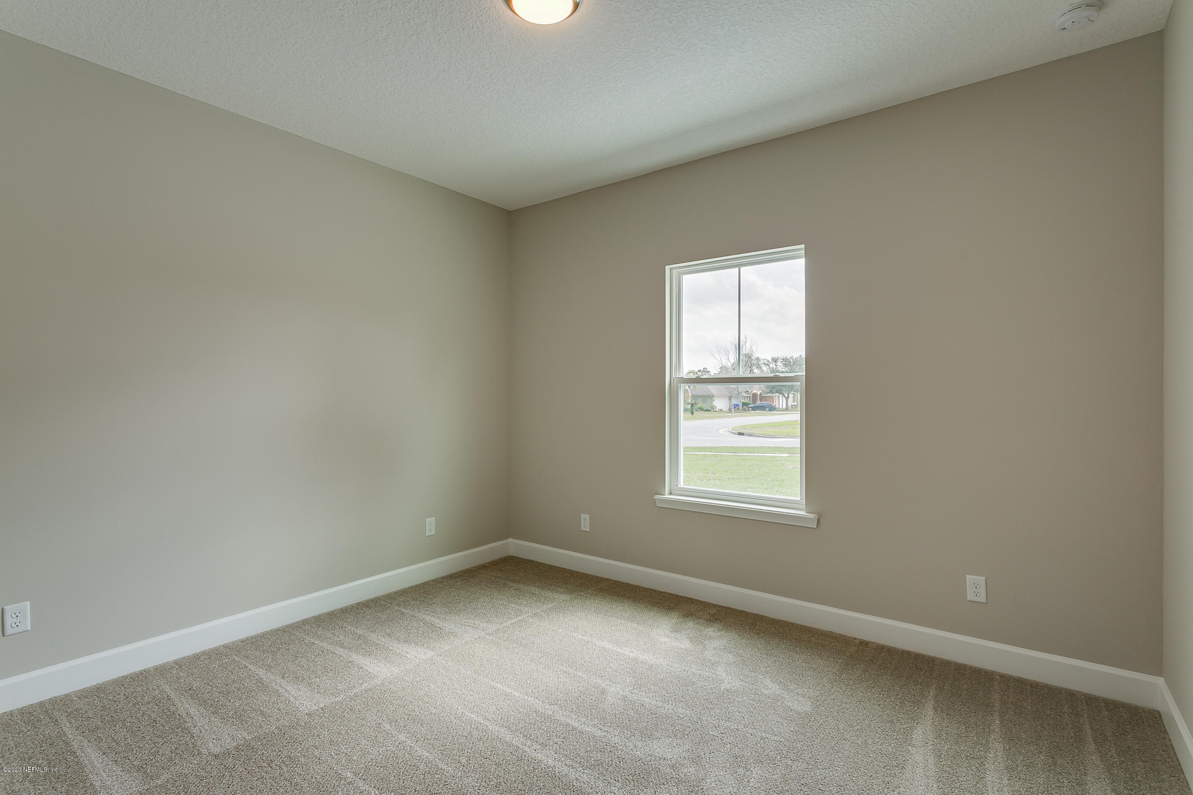 596 West Bianca Circle St. Augustine, FL 32086 - Photo 26 of 37 an empty room with a window
