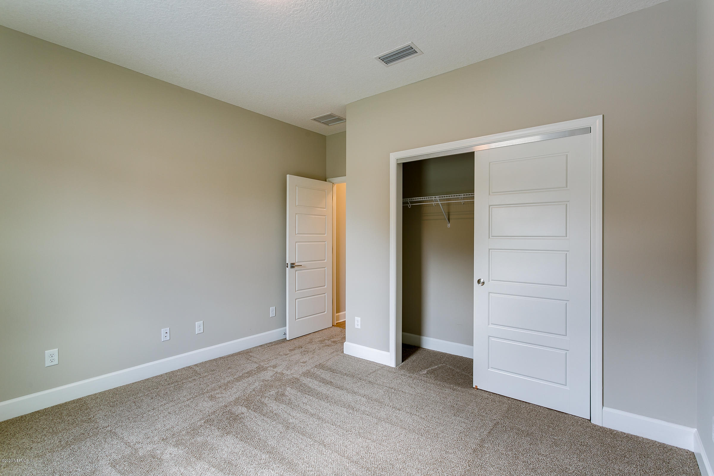 596 West Bianca Circle St. Augustine, FL 32086 - Photo 27 of 37 an empty room with closet