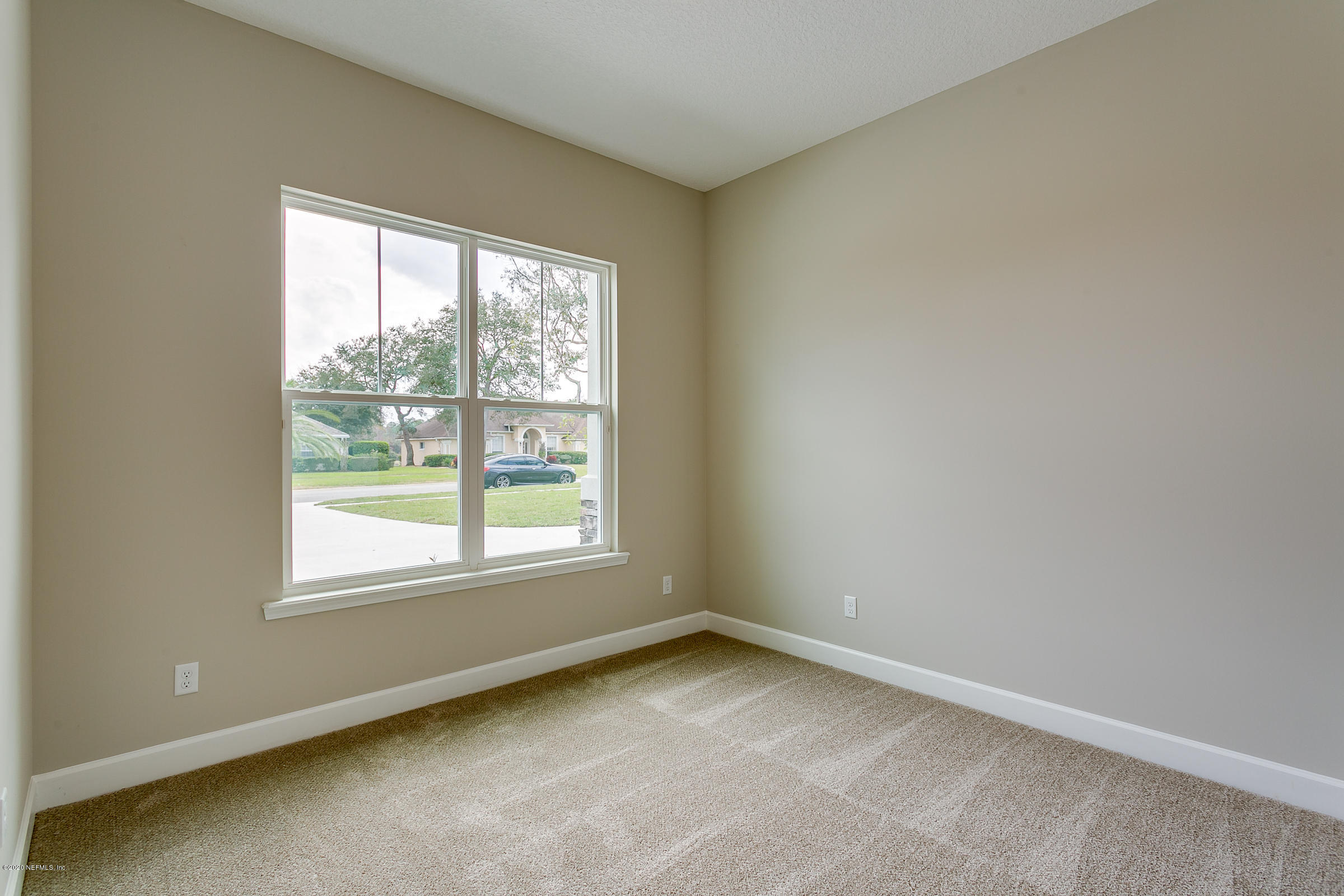 596 West Bianca Circle St. Augustine, FL 32086 - Photo 29 of 37 an empty room with a window