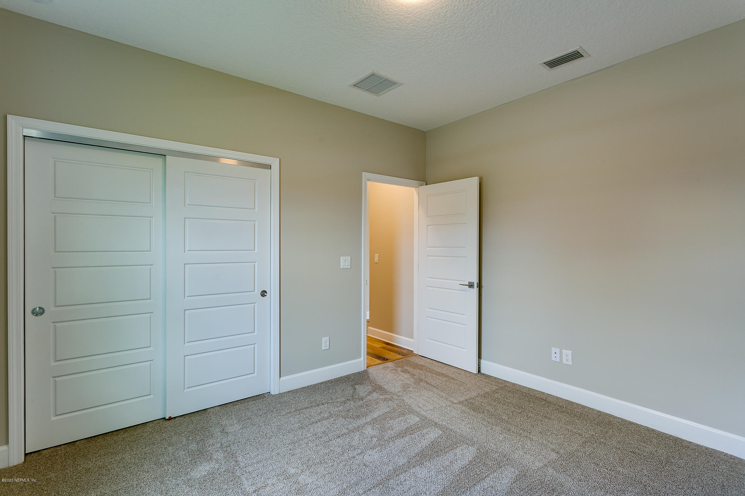 596 West Bianca Circle St. Augustine, FL 32086 - Photo 33 of 37 an empty room with closet area