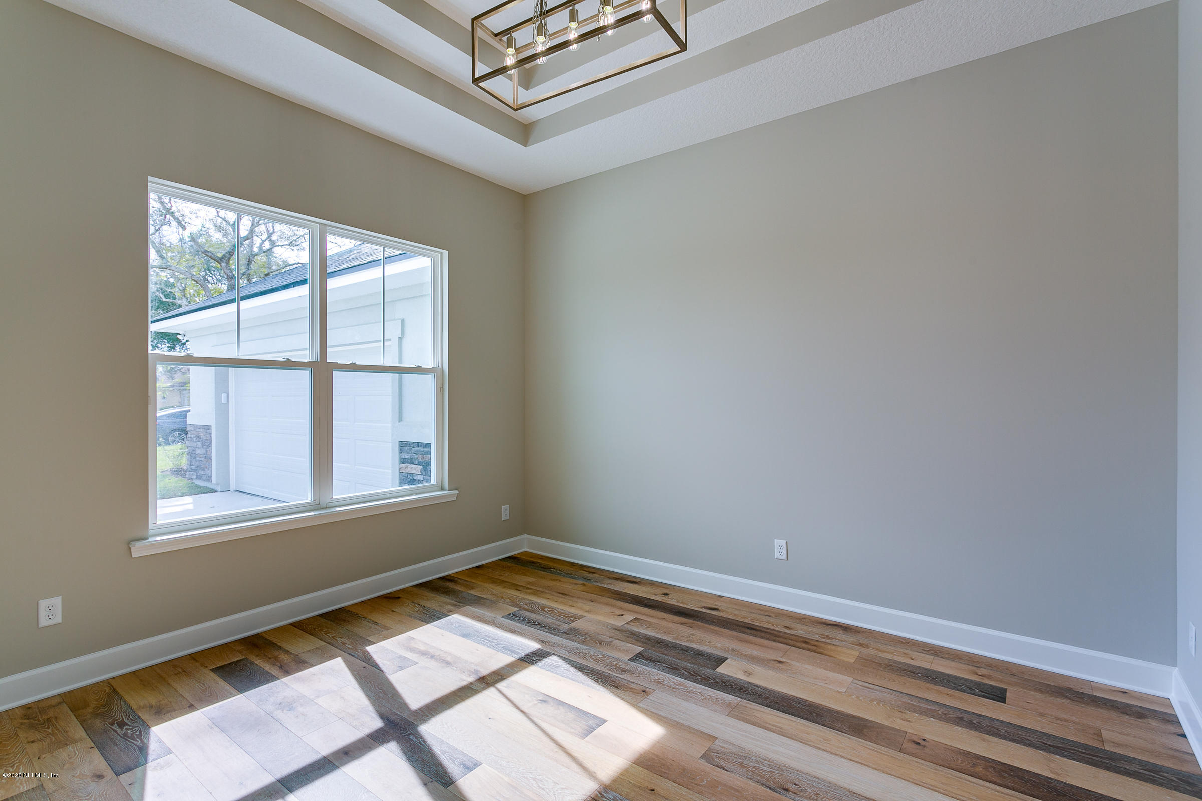 596 West Bianca Circle St. Augustine, FL 32086 - Photo 7 of 37 an empty room with a window