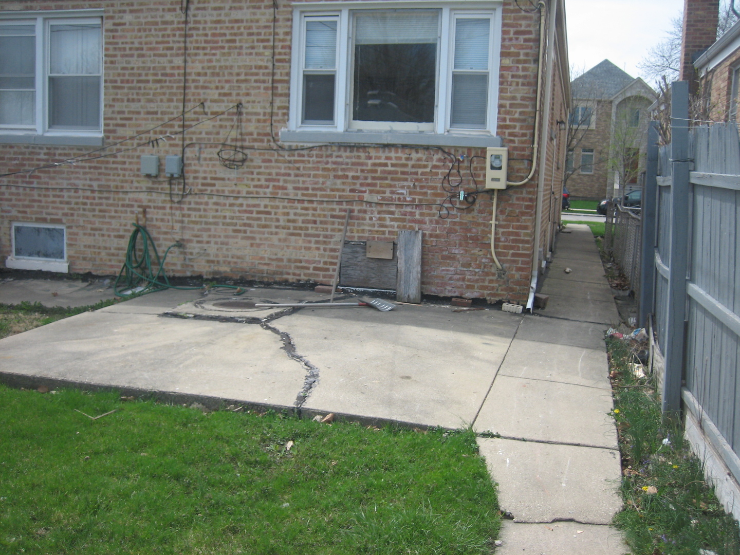 6141 North Harding Avenue Chicago, IL 60659 - Photo 3 of 11 a view of a backyard with plants