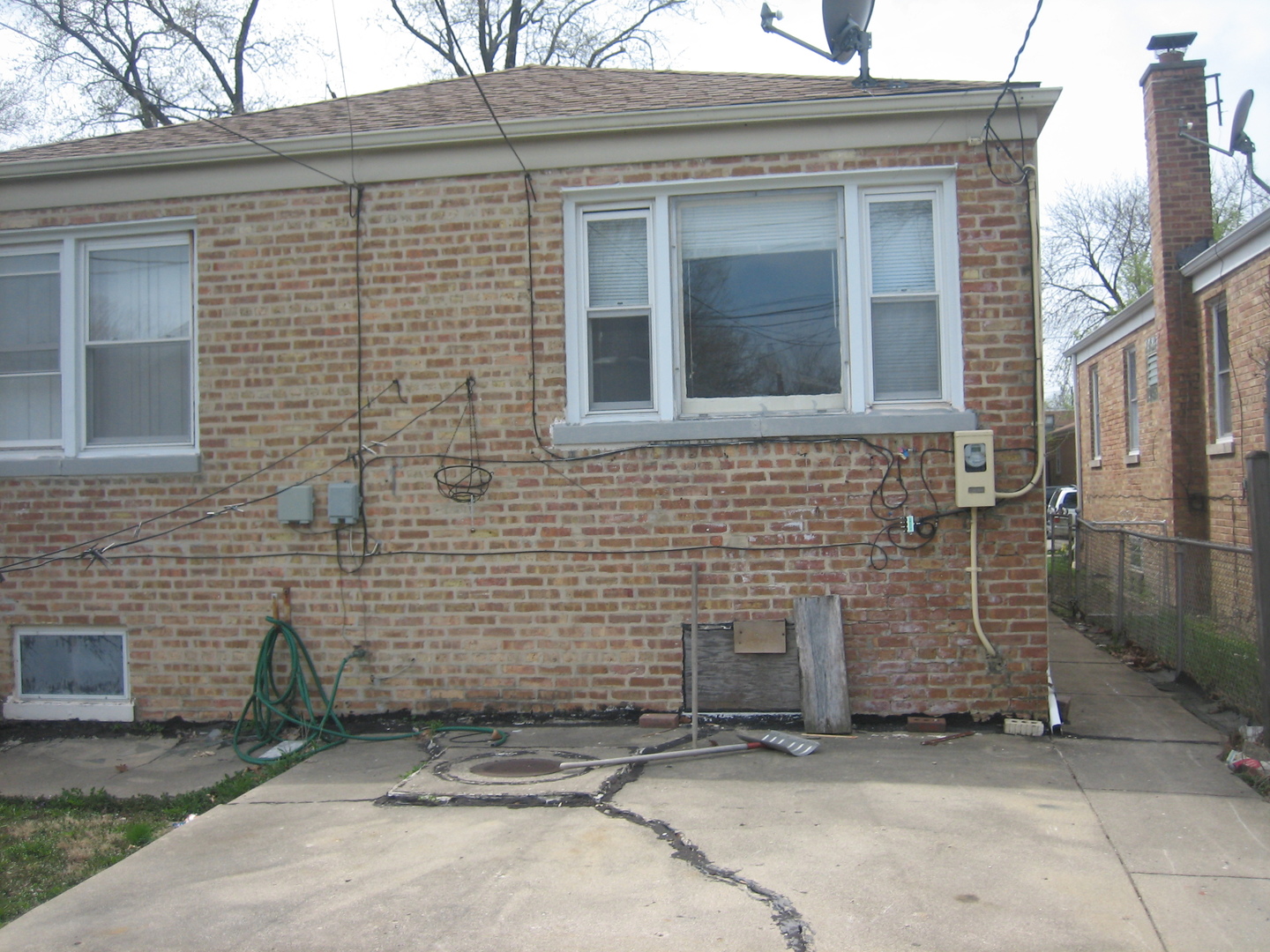 6141 North Harding Avenue Chicago, IL 60659 - Photo 4 of 11 a front view of a house with a garage