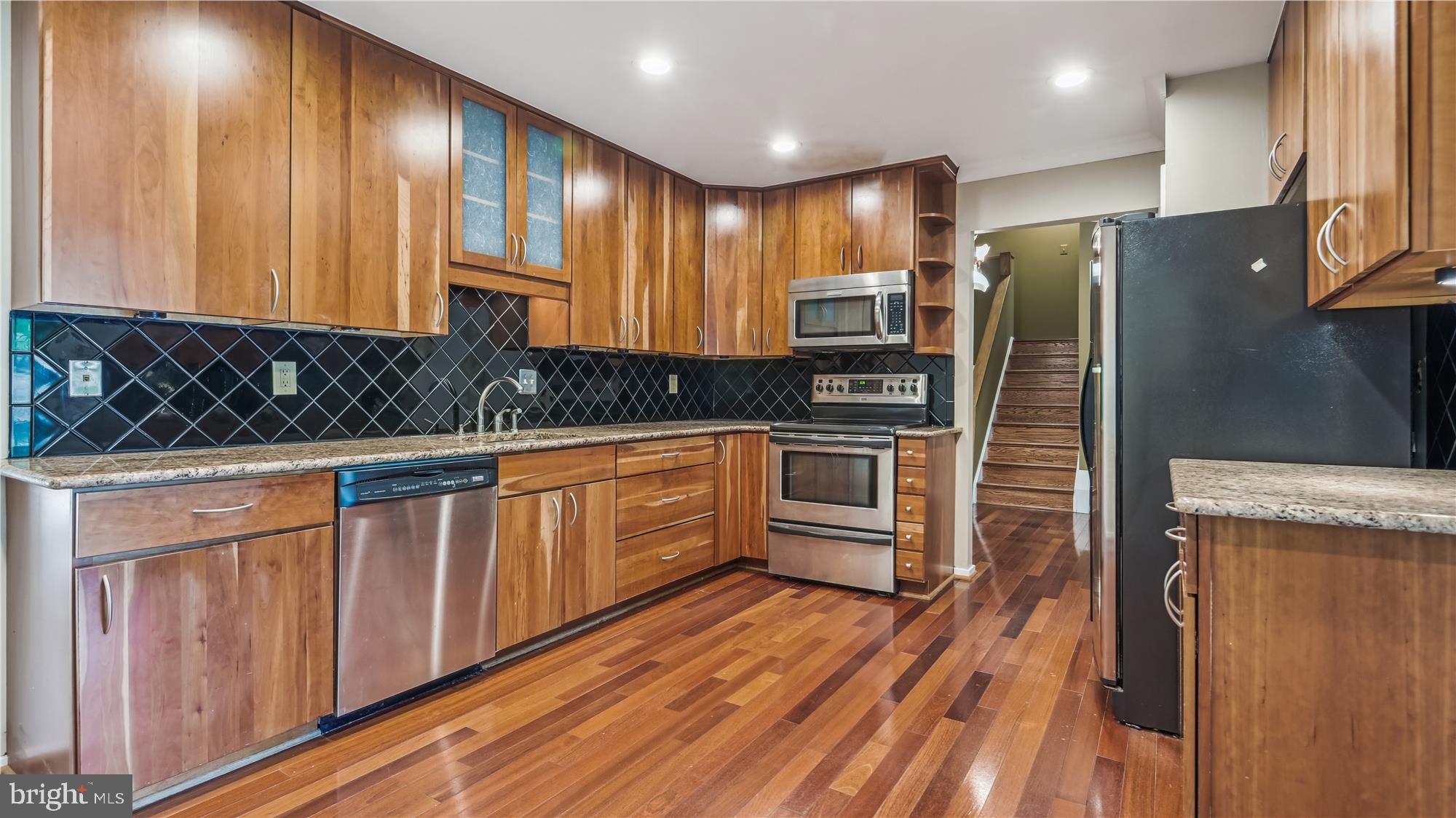 1411 Wolftrap Run Road Vienna, VA 22182 - Photo 3 of 48 Updated kitchen with custom cabinets