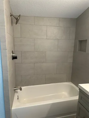a bathroom with a bathtub