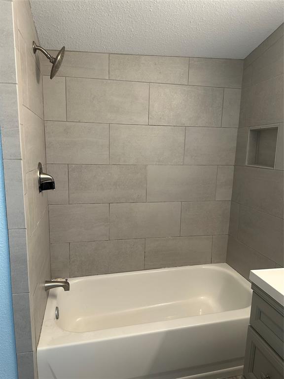 2058 Collins Avenue Abilene, TX 79603 - Photo 11 of 11 a bathroom with a bathtub