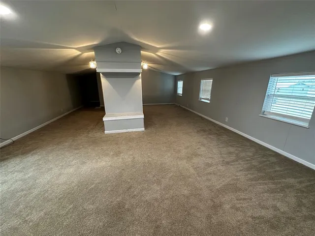 a view of a livingroom with a fireplace