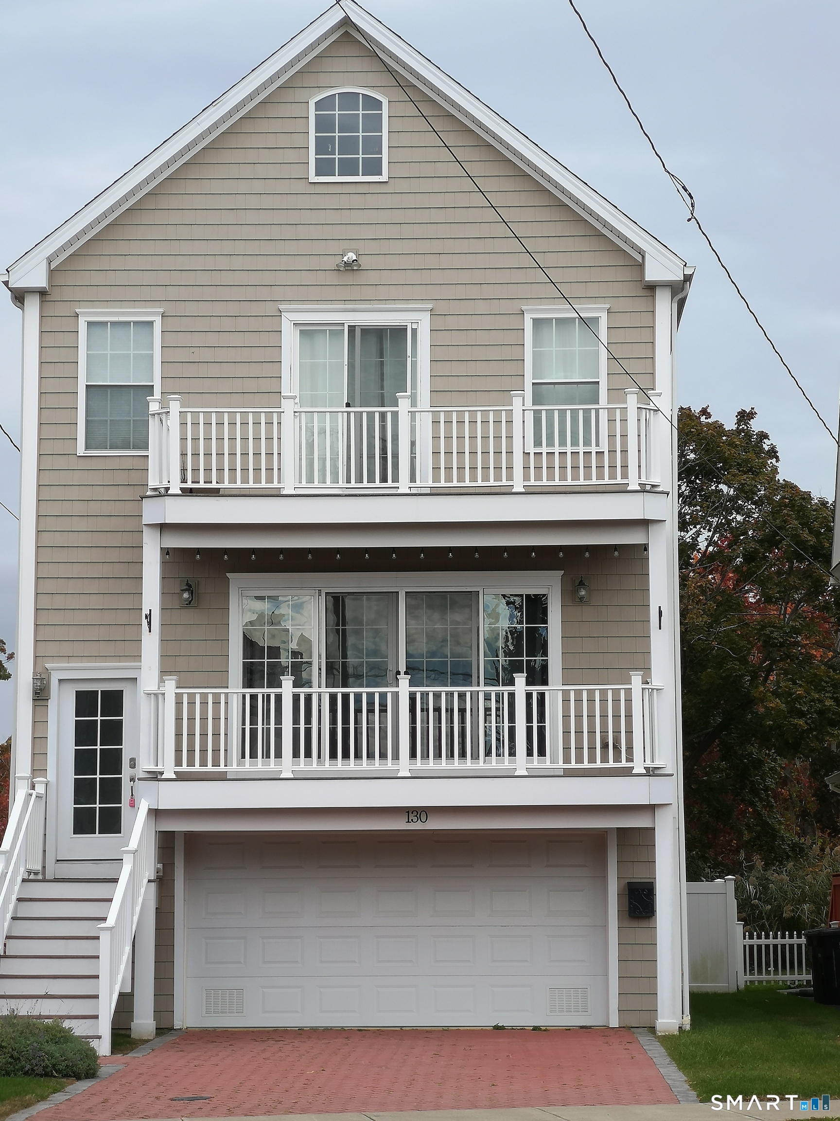 a front view of a house with porch