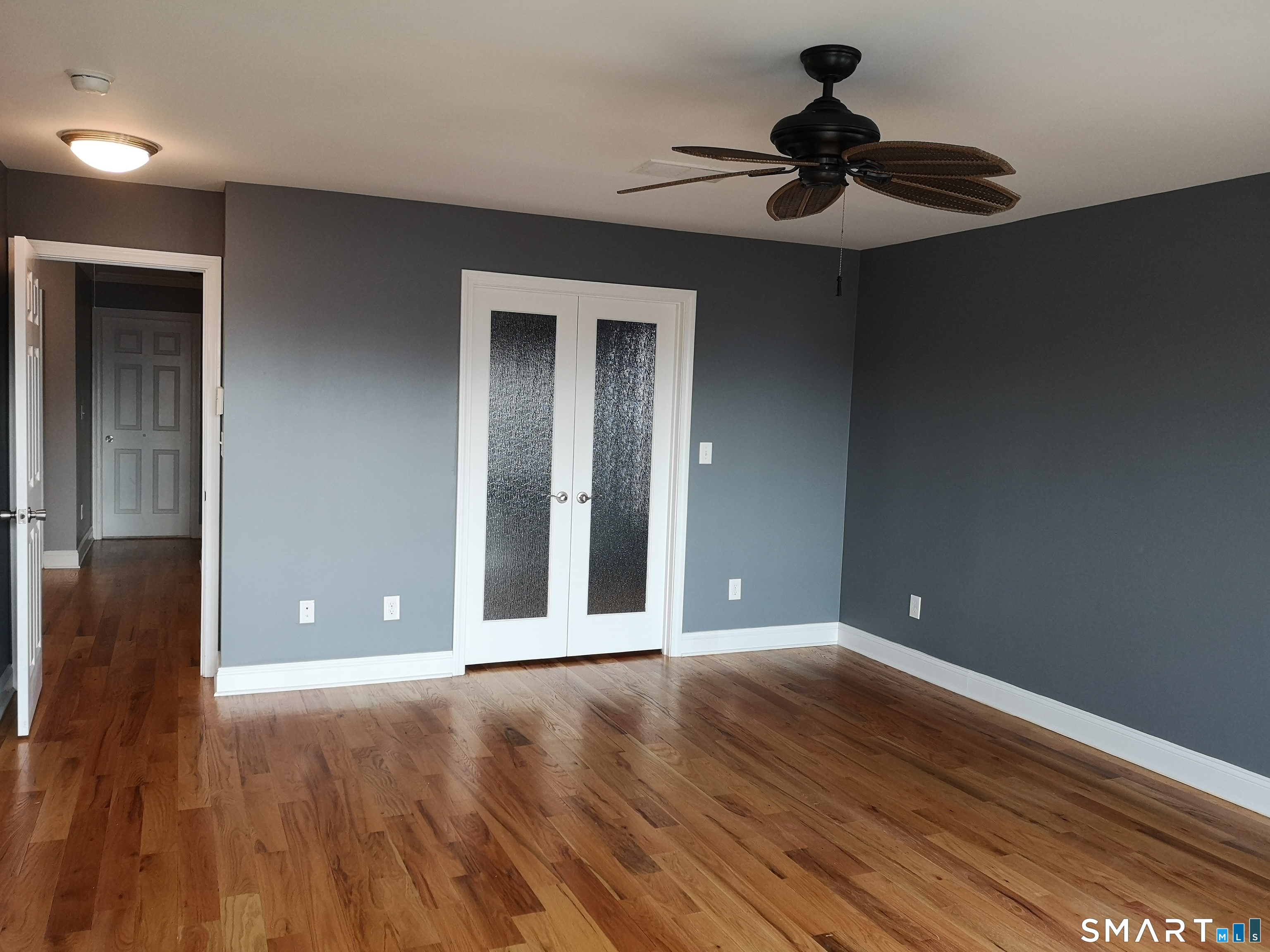 130 Merwin Avenue Milford, CT 06460 - Photo 14 of 22 a view of an empty room with wooden floor