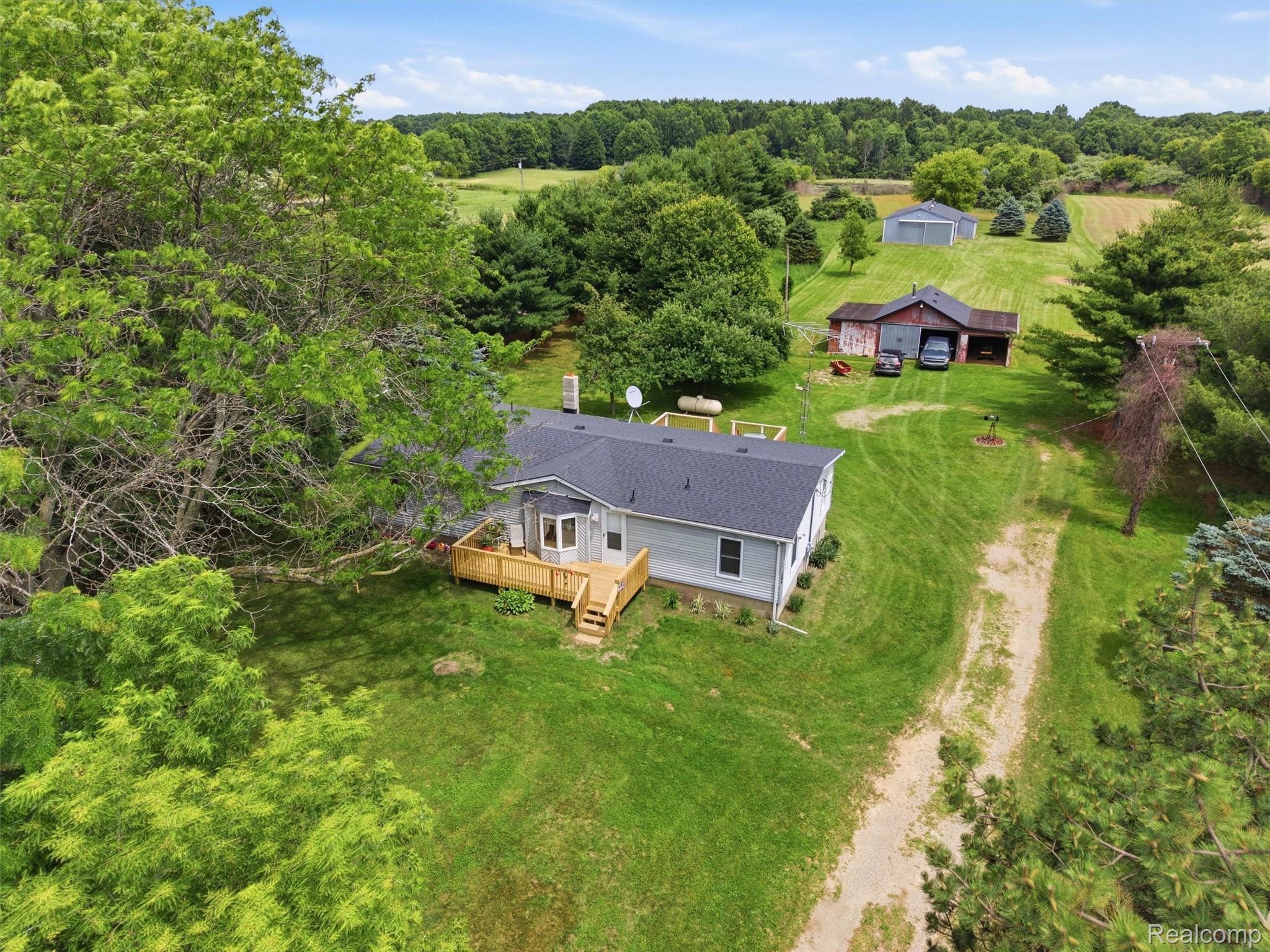 2976 Slattery Road Attica, MI 48412 - Photo 58 of 72 011-DJI_20260629142445_0895_D.jpg