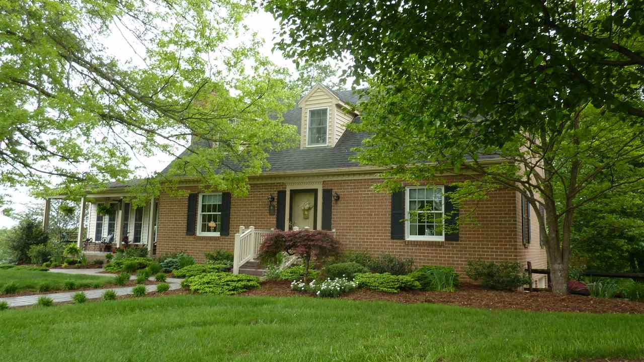 460 Wolf Ridge Road Bridgewater, VA 22812 - Photo 1 of 32 a front view of a house with a garden