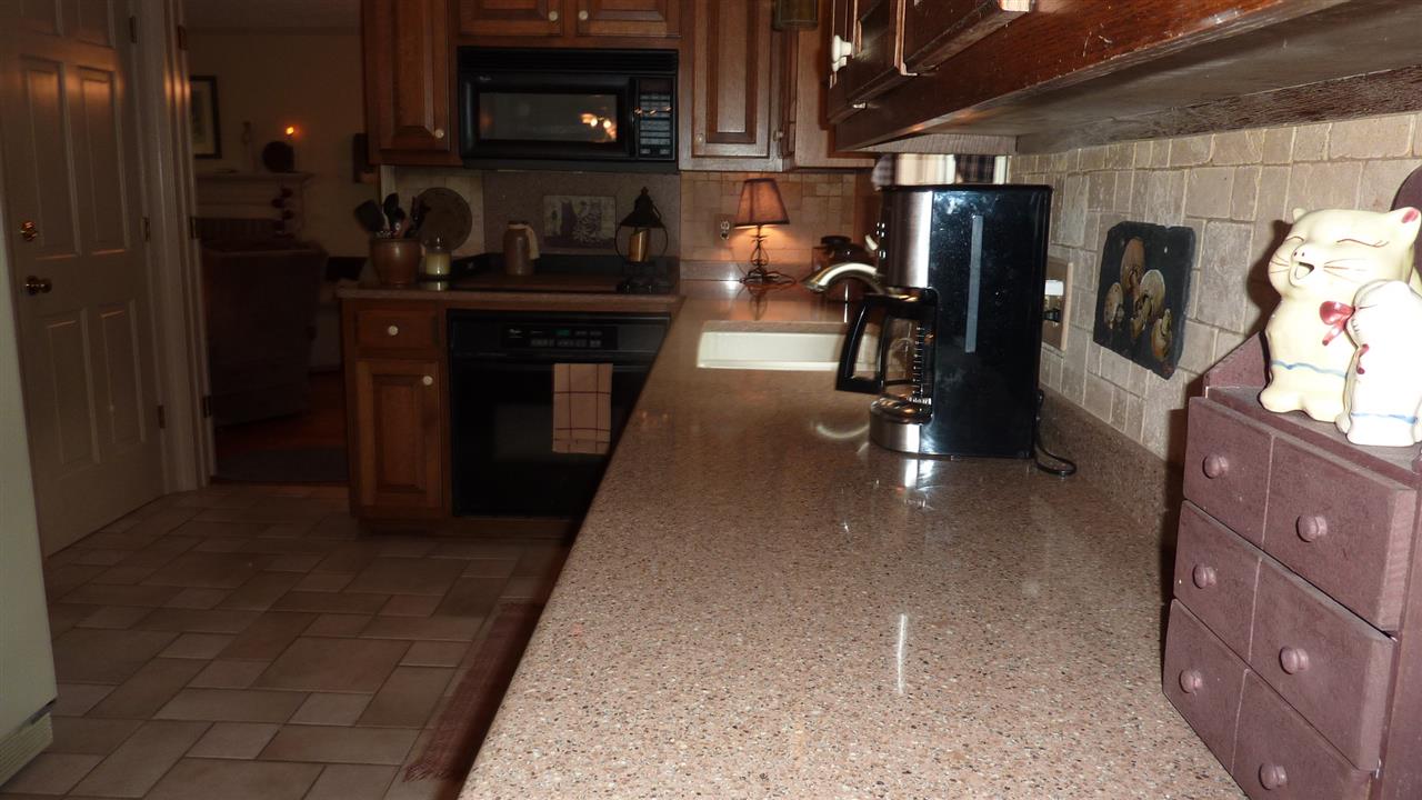 460 Wolf Ridge Road Bridgewater, VA 22812 - Photo 14 of 32 a kitchen with refrigerator and washer