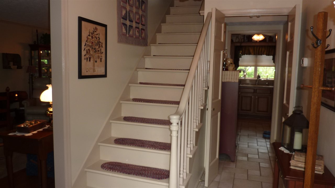 460 Wolf Ridge Road Bridgewater, VA 22812 - Photo 23 of 32 a view of staircase with white walls and door