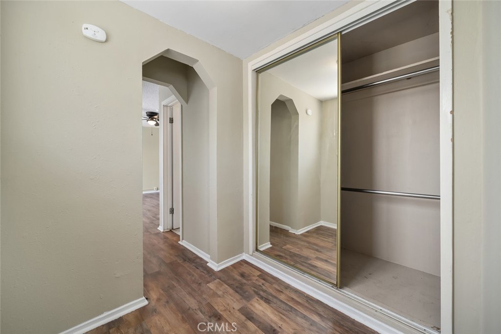 3505 Spring Street Paso Robles, CA 93446 - Photo 14 of 19 a view of a kitchen with a refrigerator and wooden floor