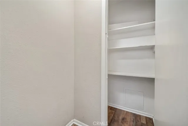 a view of an empty walk in closet