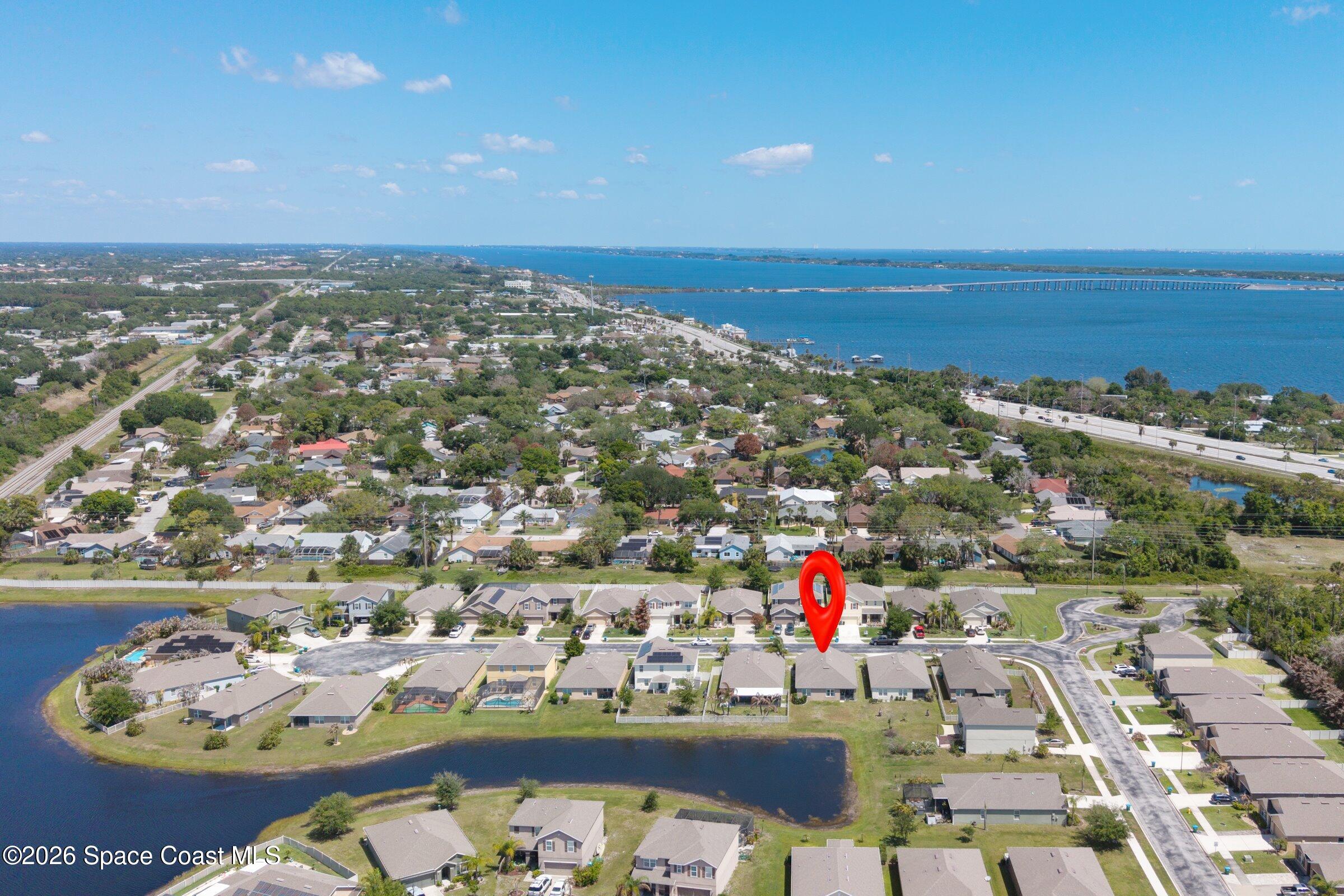 2213 McCormack Way Melbourne, FL 32935 - Photo 43 of 73 an aerial view of a city
