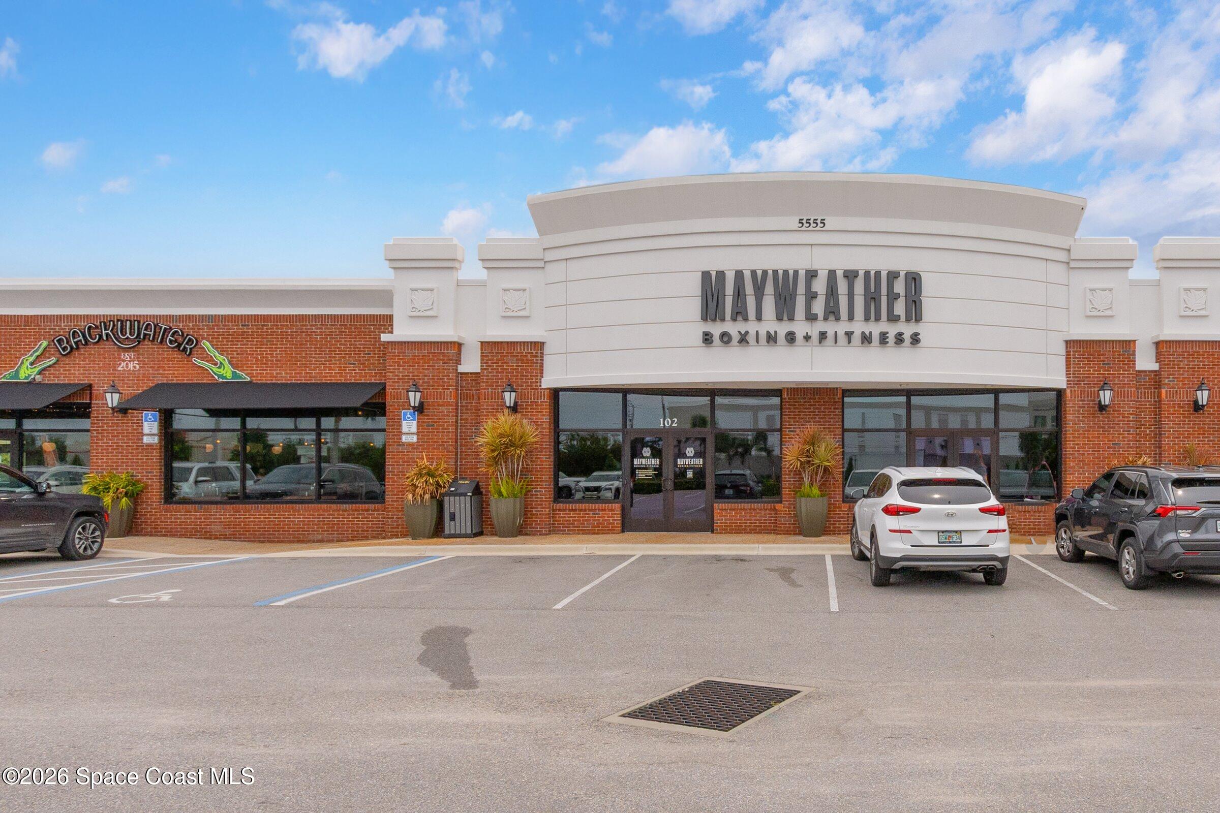 2213 McCormack Way Melbourne, FL 32935 - Photo 58 of 73 a view of car parking area