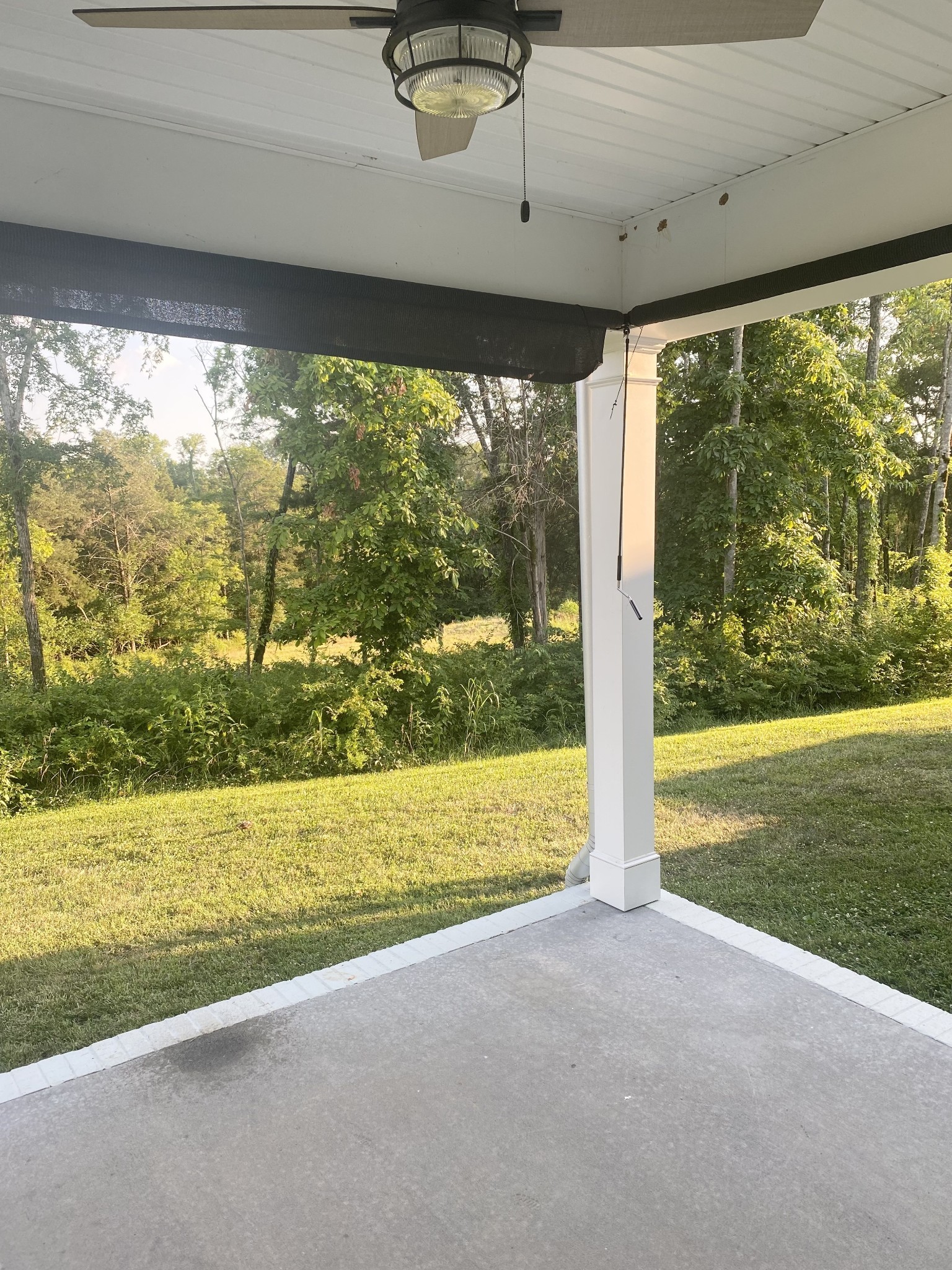 1144 Lock 4 Road, Unit J1 Gallatin, TN 37066 - Photo 32 of 52 Another view of the beautiful backyard! Hot day? Enjoy the breeze provided by the ceiling fan!