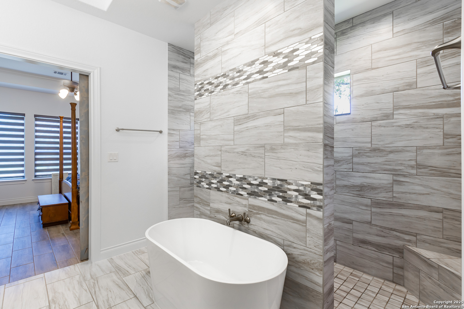 34784 High Gate Road Bulverde, TX 78163 - Photo 16 of 34 a bathroom with a sink a toilet and shower