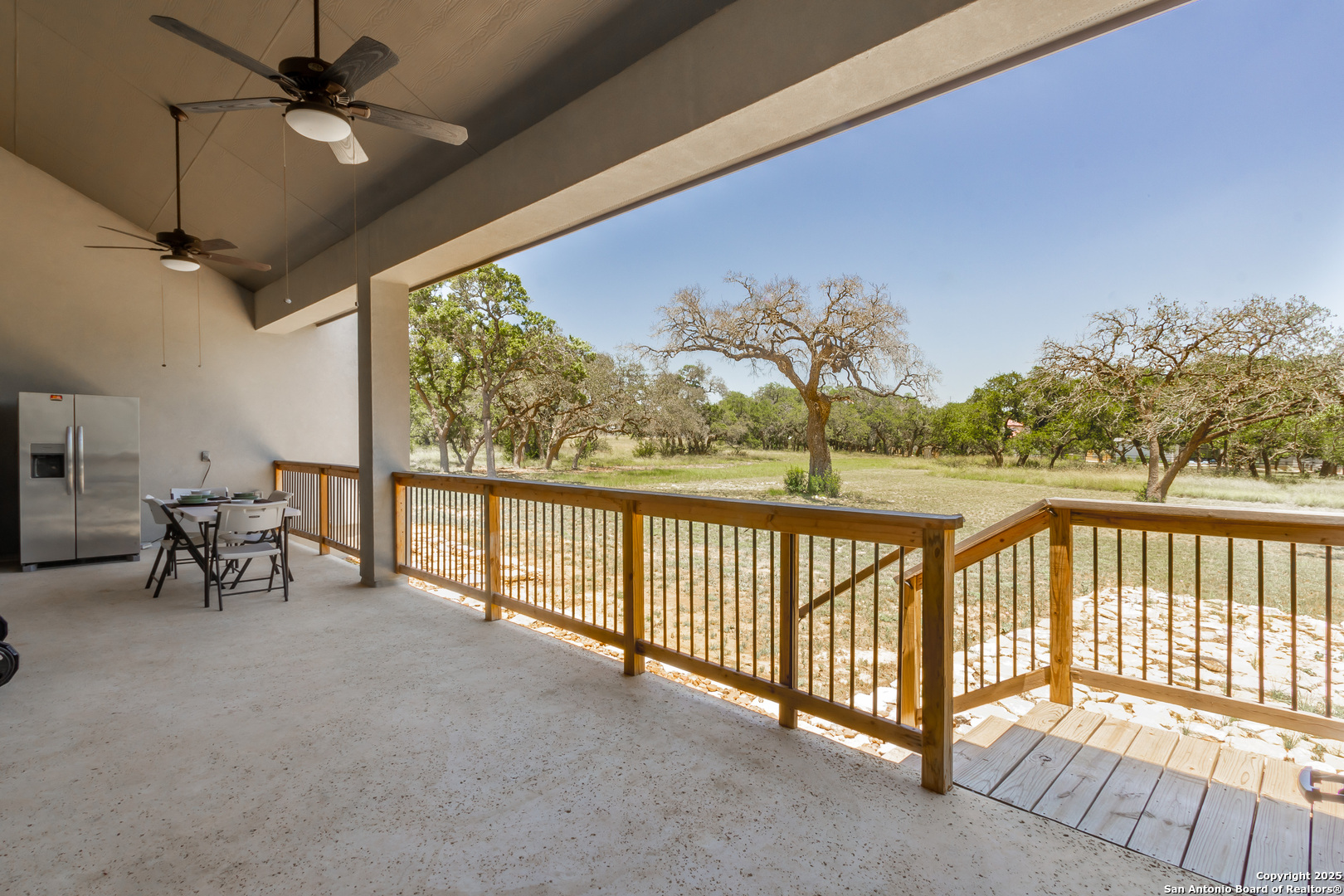 34784 High Gate Road Bulverde, TX 78163 - Photo 24 of 34 a view of a porch with furniture