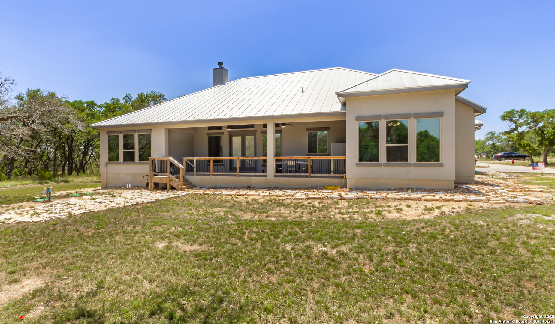 34784 High Gate Road Bulverde, TX 78163 - Photo 25 of 34 front view of a house with a yard
