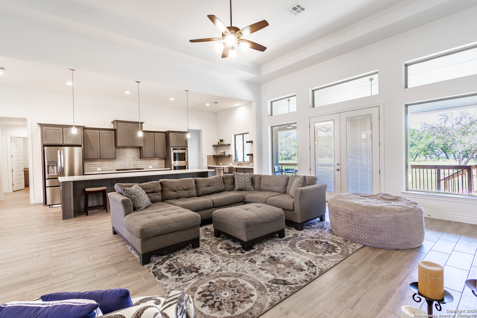 34784 High Gate Road Bulverde, TX 78163 - Photo 8 of 34 a living room with furniture and a large window